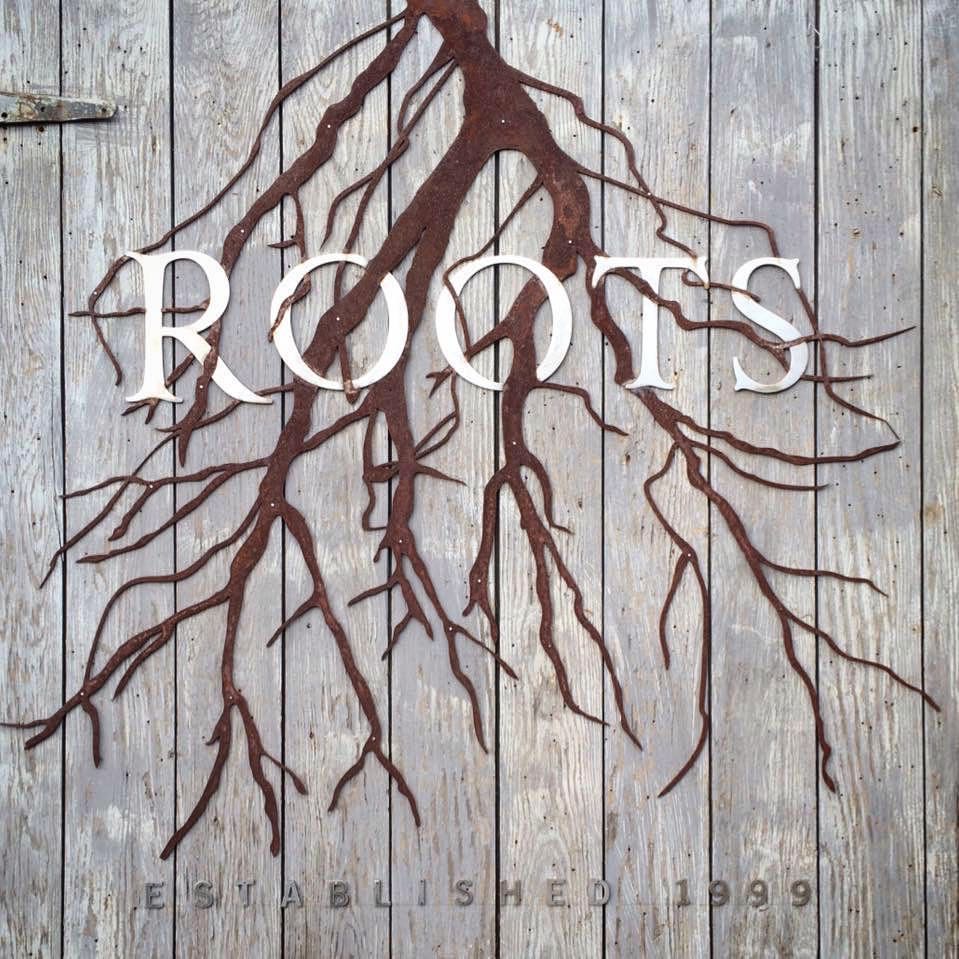 A sign that Solid Form created for Roots Wine Co.