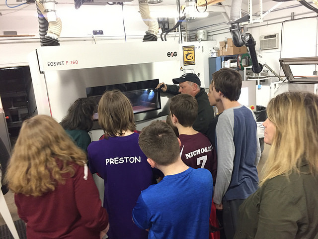 McMinnville Middle School Students observe a 3D printer using a SLS (Selective Laser Sintering) Process