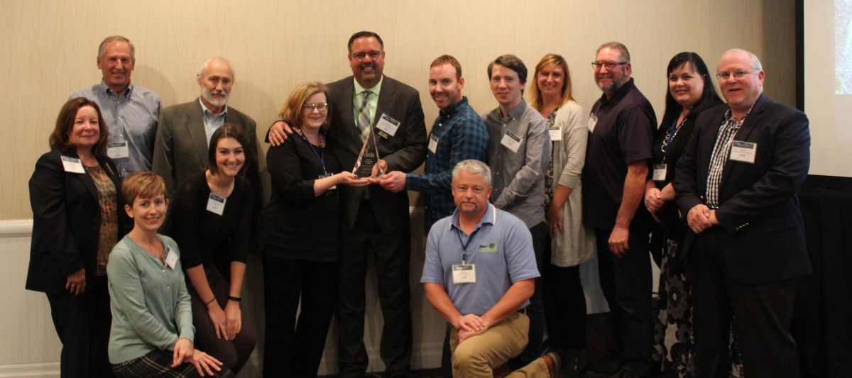 Partners on the Organic Valley Project take a photo at OEDA's Annual Conference