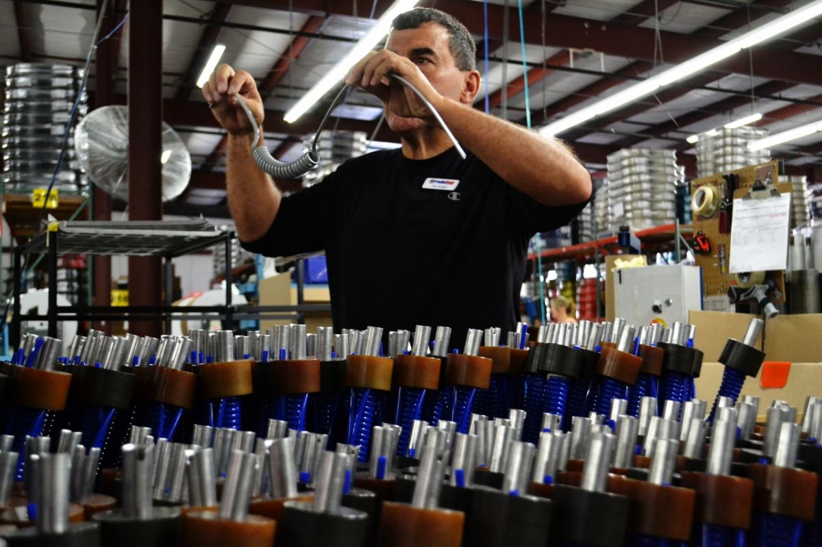  Production Supervisor at Freelin-Wade, Jon Briggs, shows McMinnville WORKS Interns Freelin-Wade products during a tour. 