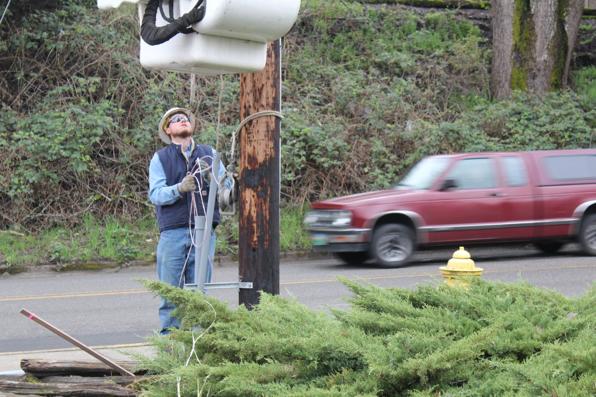 Richard Skeffington works to connect and underground line for a project in McMinnville