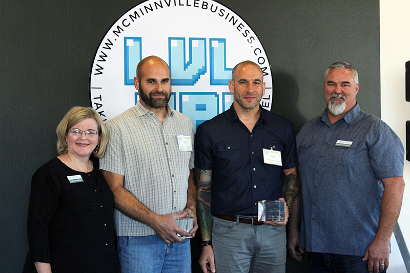 Deven and Keath Paolo accept the Manufacturing Leaders of the Year award