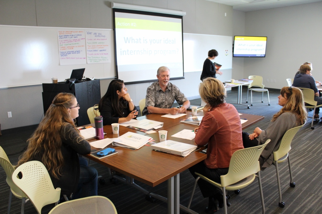 Workshop participants discuss their ideal community internship program.