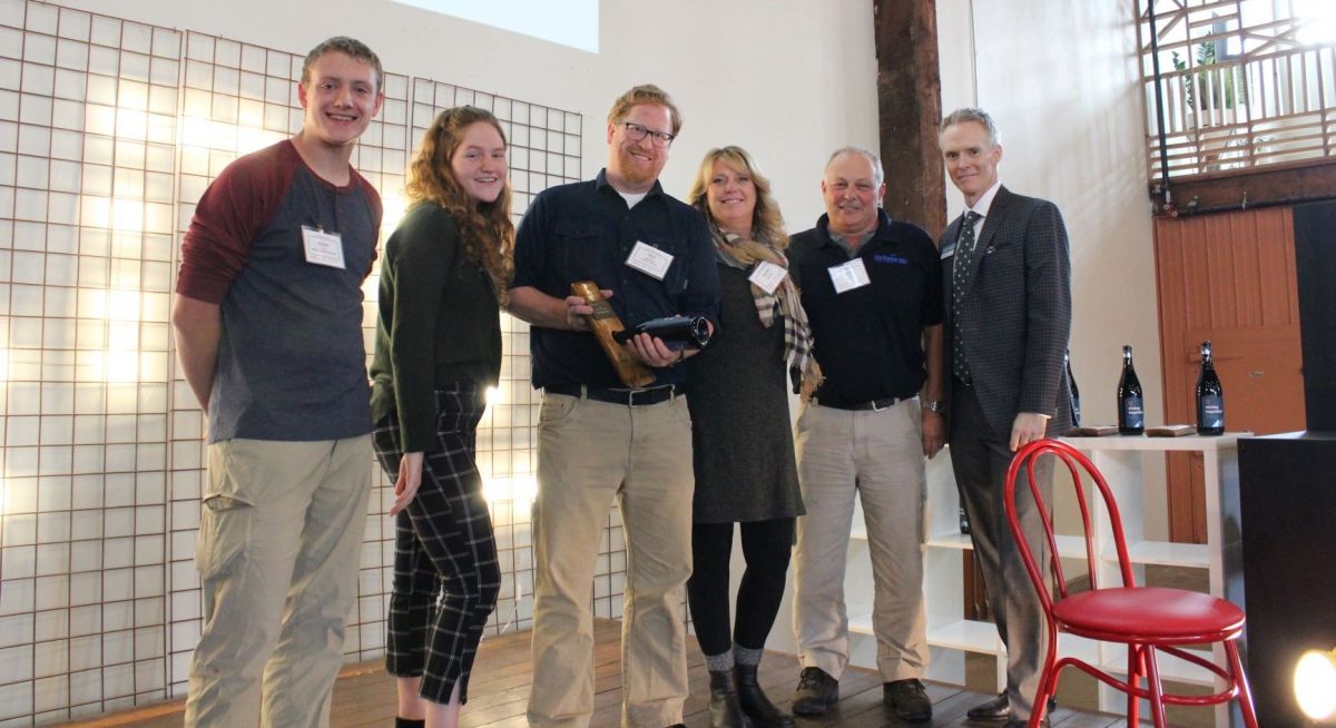 From left to right: High school students Byron Nice, Laura Denney, MHS Teacher David Larson, NWUAV’s Heather Sorenson and Chris Harris, MEDP Executive Director Scott Cooper