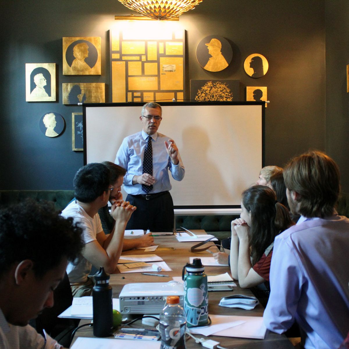 A community leader speaking to interns